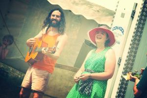Kiri and Joe singing up a storm of gratitude at the final lunch time queue.
